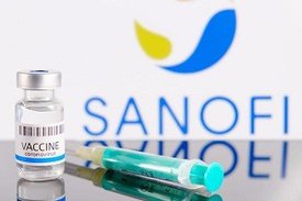 Foto eines Impfstoffes und einer Spritze